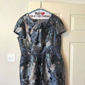 Women’s blue floral dress.